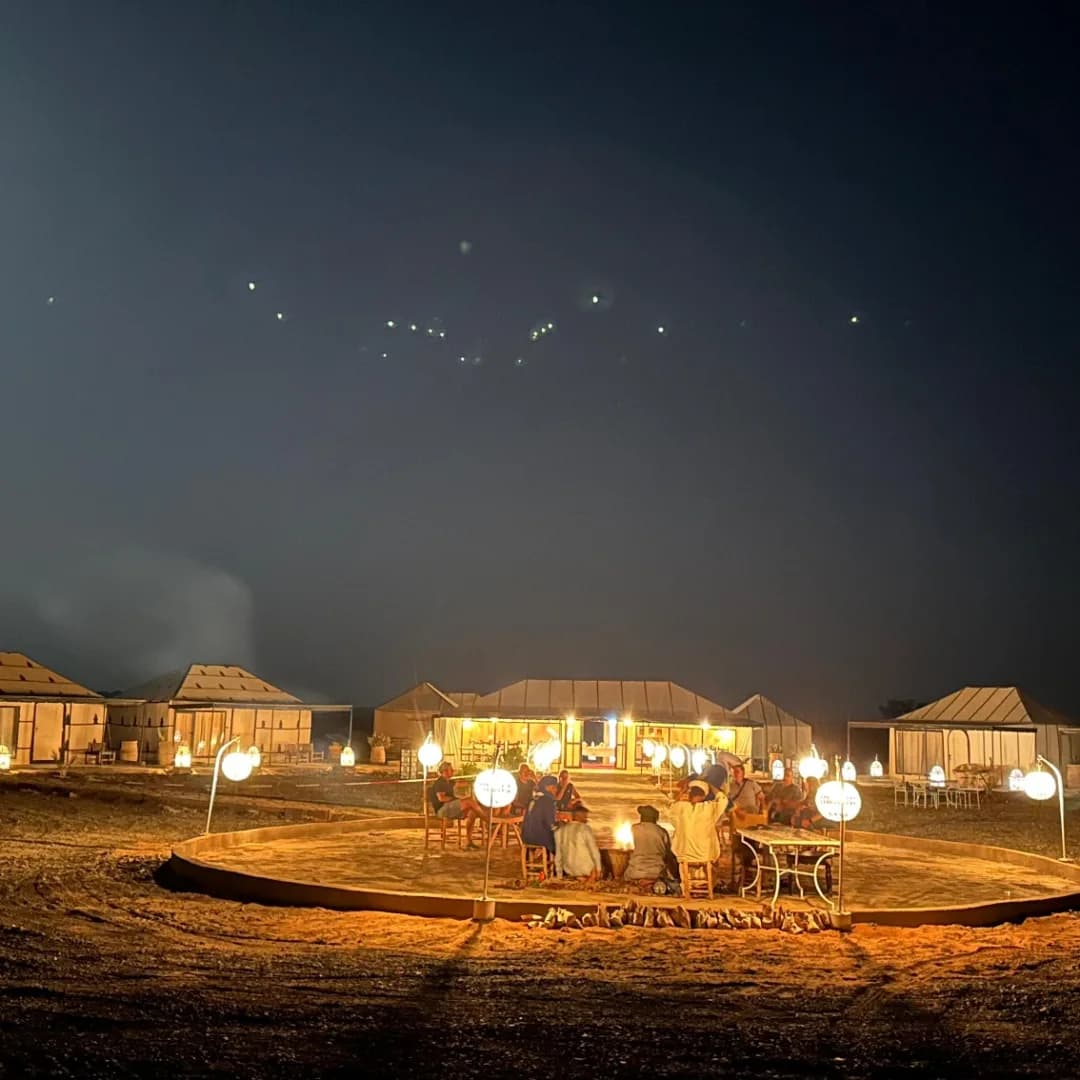 luxury desert camp at night merzouga