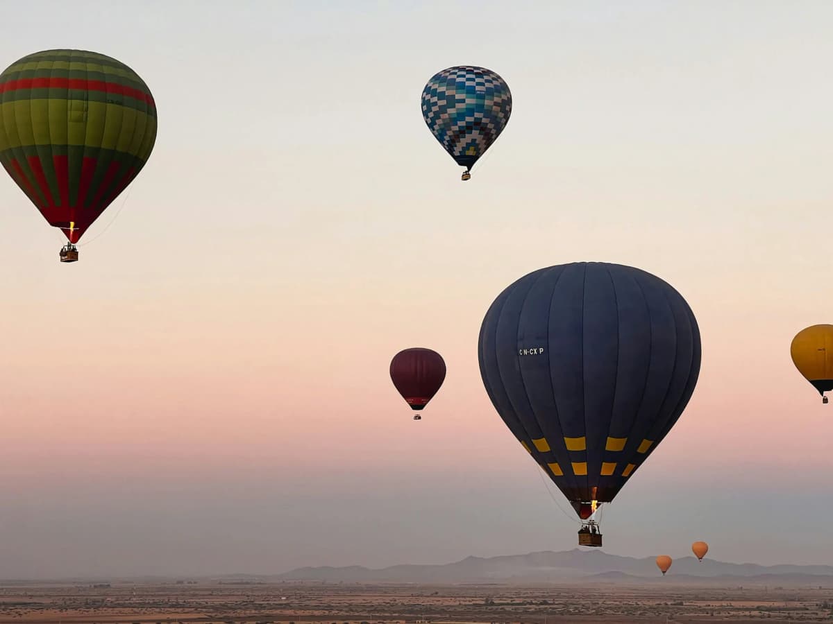 Hot air balloon Marrakech Morocco at sunrise over the countryside