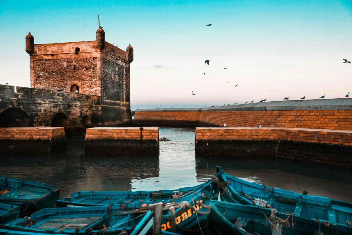 Blue fishing boats in Essaouira port on Morocco Atlantic coast