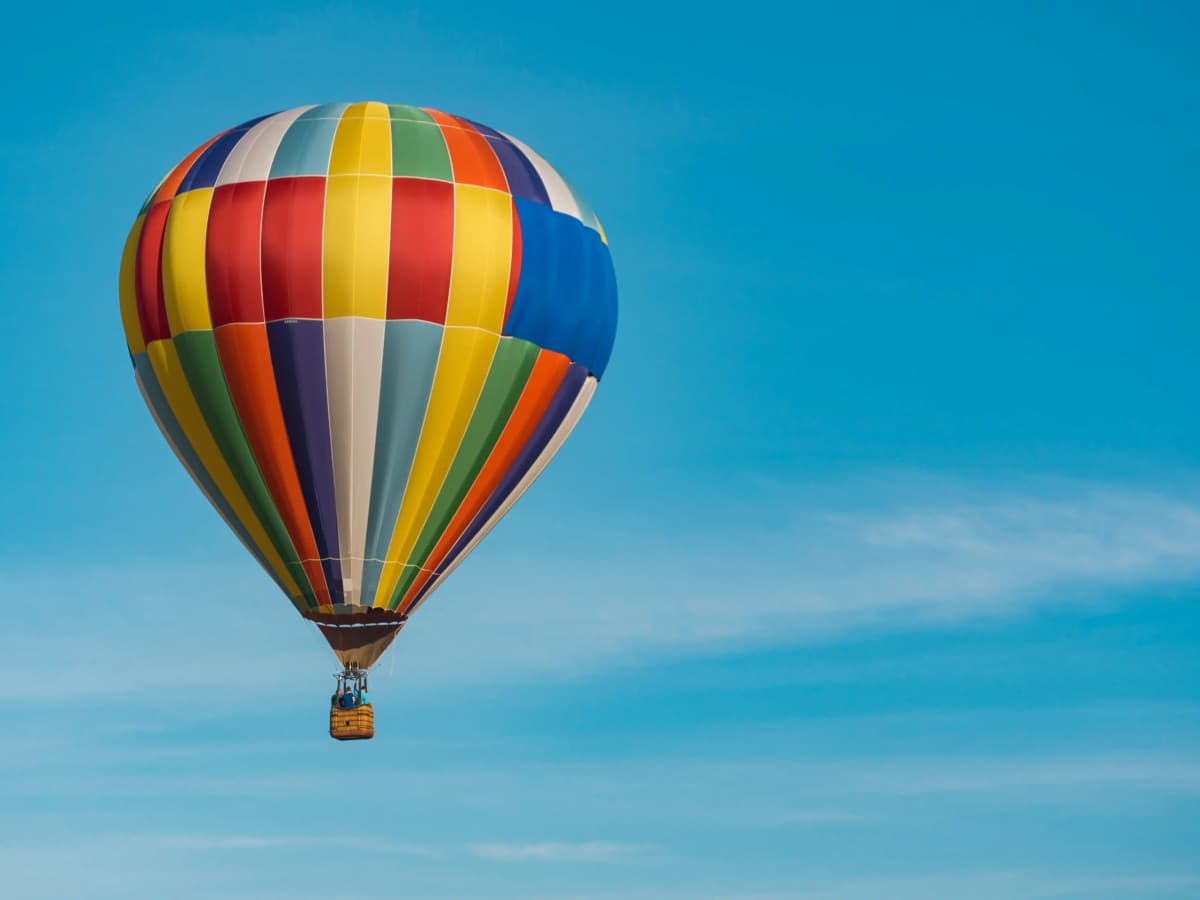 Hot air balloon flight near Marrakech with Atlas Mountains in the distance