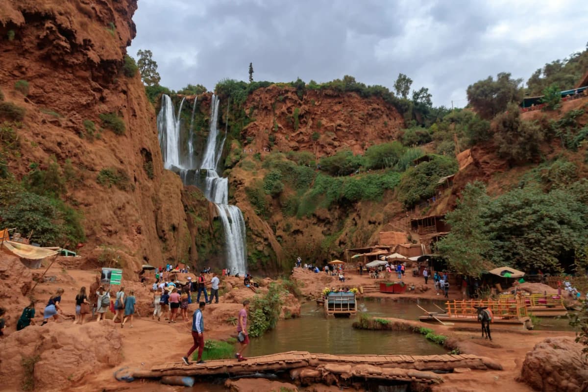 Traditional wooden boat below Ouzoud Waterfalls in Morocco